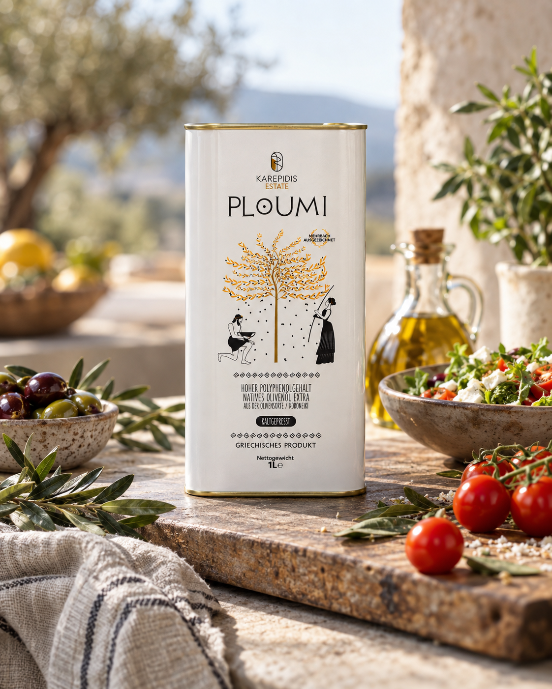PLOUMI 500+ 1L tin on a wooden board with olives, tomatoes and a Mediterranean salad